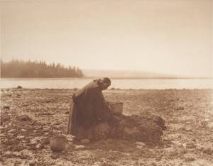 The Mussel Gatherer is an example of Edward Curtiss photographs of Native Americans included in his monumental 40 volume The North American Indian. Curtiss photographs are criticized for being a romanticized, pictorialist version of Native American life. They represent a past that no longer existed in the face of the harsh realities of Native American life at the time his photographs were taken. (Edward Curtis photo, courtesy Smithsonian Libraries)
