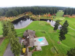 An aerial view of the late Tom Stewarts former 6,500-square-foot home and surrounding property, shown in a recent listing for the property. (Vancour Realty photo)
