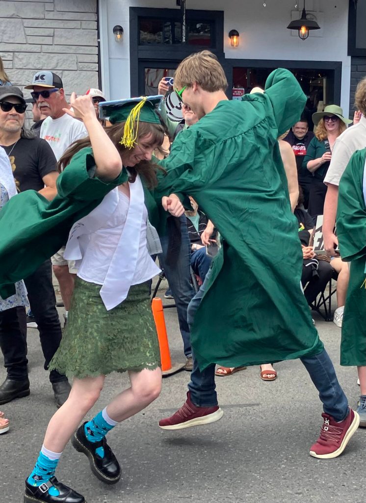 Graduates danced in the street at the end of the parade. (Courtesy photo)