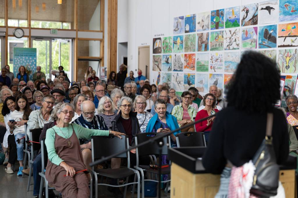 Yasmin Ravard-Andresen led the crowd in a performance of Lift Every Voice and Sing, a hymn often referred to as the Black National Anthem. (Alex Bruell photo)