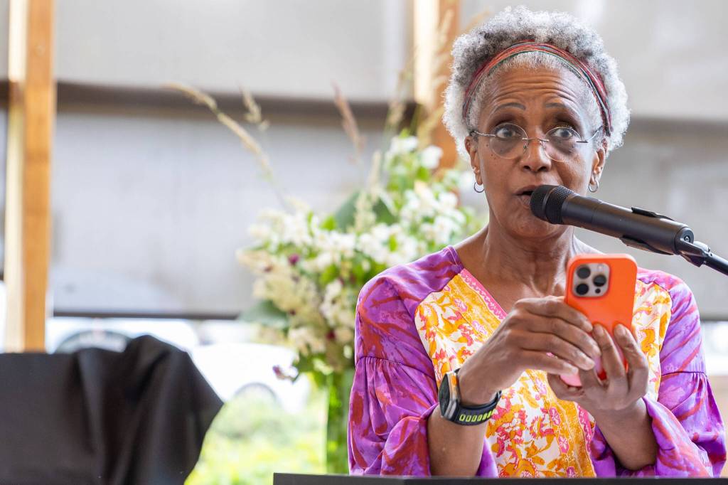 Speaker Nan Wilson reads General Order #3 at the ceremony. (Alex Bruell photo)