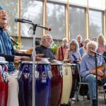 Musician Gordy Ryan led drummers, singers and more musicians in performing African songs of celebration, love and inner strength. (Alex Bruell photo)