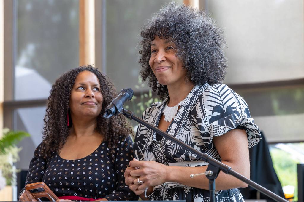 Betty Peralta and Rev. Amelia Bolyard, relational health consultants, spoke to the ways anyone can practice reconciliation during the Juneteenth ceremony. (Alex Bruell photo)