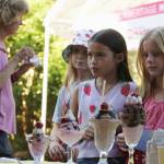 Arden, Lamai and Mia (all 9 years old) await receiving ice cream at the Vashon Island Heritage Museums ice cream social during the 2024 Strawberry Festival. (Alex Bruell file photo)