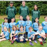 The W.O. Man City team from left to right, including (back row/coaches): Devin Branson, Brad Claus and Nicole Tadano; (middle row) Violet Provo, Dakota Branson, Clara Langland, Cora Banducci, Mia Doyle, Sierra Stein and Blake Smith; and (front row) Arden Arthur, Gwen Buse, Joss Moe, Vivian Claus and Isla Peterson. (Jonathan Stein photo)