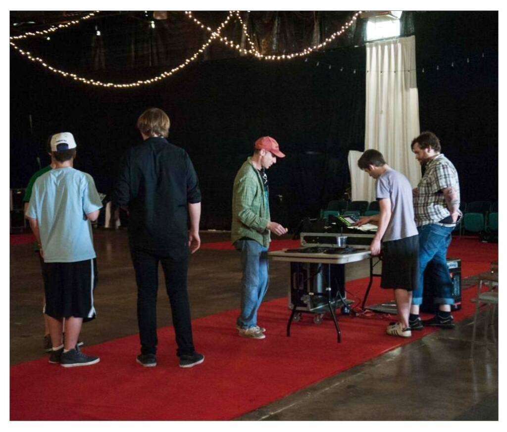 Sharing the Stage Photo
Harris Levinson with youth musicians before a Sharing the Stage show