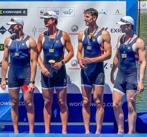 The U.S. quad sculls boat accepts their bronze medal at World Cup 2 in Lucerne, Switzerland. Jacob Plihal is second from right. (Chris Plihal photo)