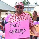 Free shrugs were just one of many quirky sources of entertainment delivered during Festival weekend. (Phil Clapham photo)