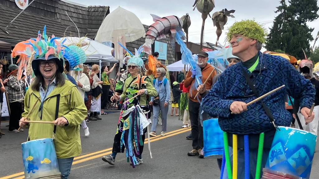 The Vashon Island Marine Band and Procession, made up of local artists, musicians, and makers in creative costumed inspired by Salish Sea life, joyously processed past islanders in the Strawberry Festival parade. (Elizabeth Shepherd photo)