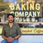 Elijah Berry sits outside Vashon Island Baking Company, the bakery he took over this year. (Phil Clapham photo)