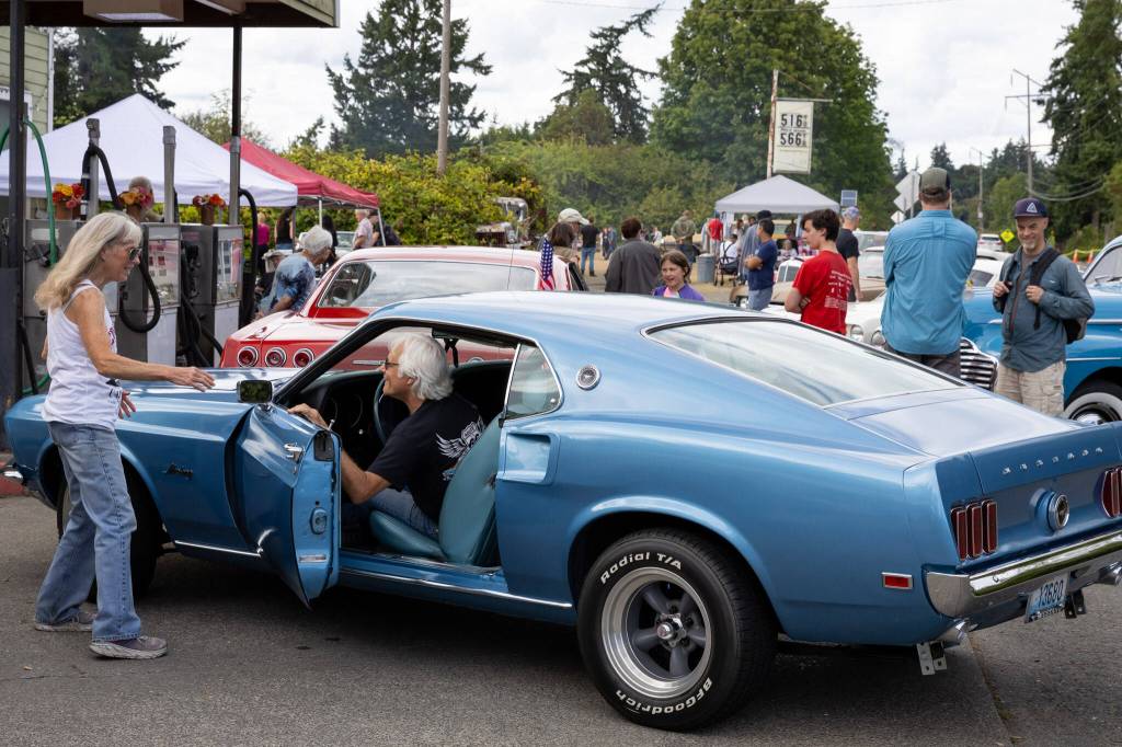 Classic cars revved up Dockton Road and spread out across the lawn at Engels Repair & Towing, bringing the curious eyes and cameras of car fans from near and far. (Alex Bruell photo)