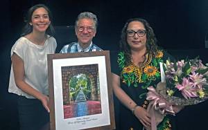 Nidia Sahagun (right), the school districts 2025 Doors of Opportunity receipient this year, was presented with flowers and a framed certificate for the prize last week by (left) India Alarcorn, from Vashon Schools Foundation, and (center) Interim Superintendent Jo Moccia. (Courtesy Photo)