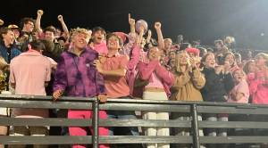 Vashon High Schools student section  known usually as The Green Tide, turned pink on homecoming.