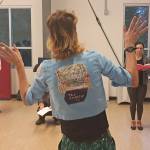 Director Brooke Osment (back to camera) directs Rocky Horror cast members in rehearsal. (Susan McCabe Photo)