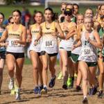 Members of the Vashon High School girls varsity cross country team run during the Fort Steilacoom Invitational in Tacoma. (John Decker Photo)