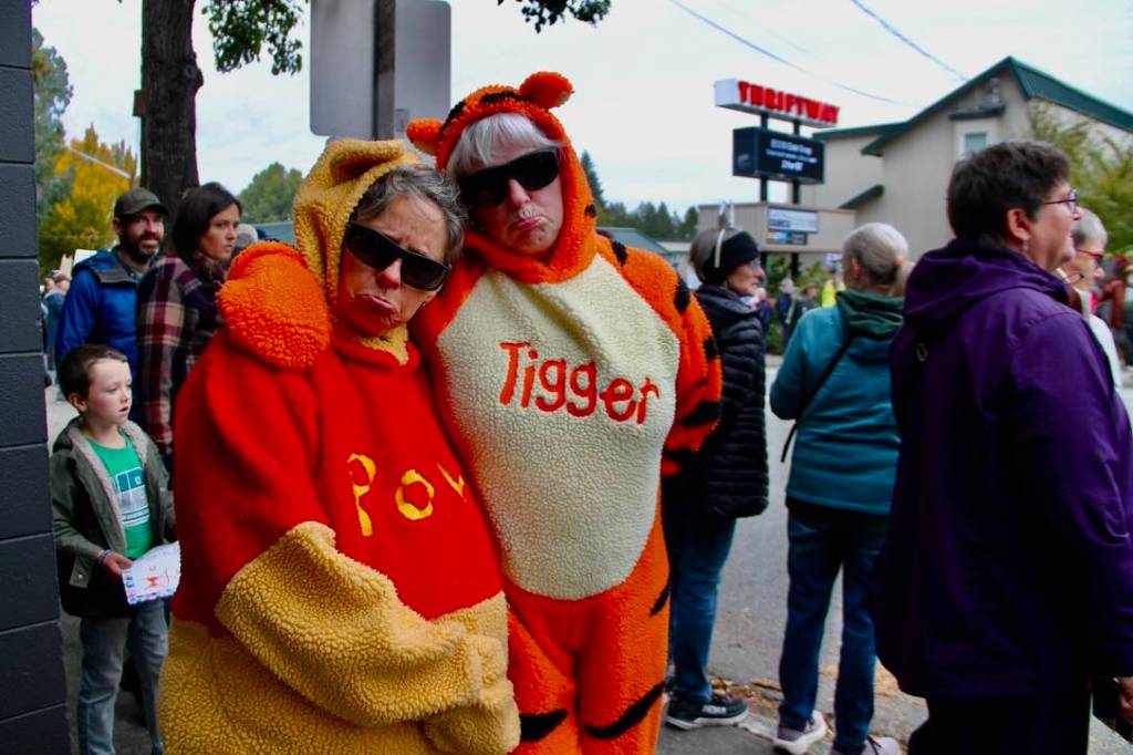 (Elizabeth Shepherd Photo)
Islanders Lynann Politte, dressed as Winnie the Pooh, and Lizz Randall, as Tigger, pose for a photo during Saturdays protest in Vashons town center. (Elizabeth Shepherd Photo)