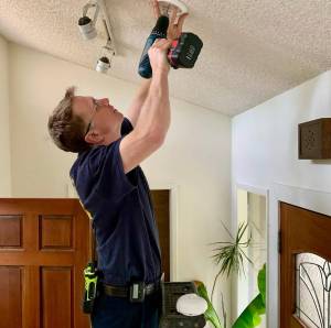 Local firefighters will bring and install new smoke detectors and/or replace batteries in existing ones in your home. (Vashon Island Fire & Rescue Photo)