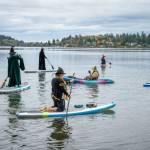 Witches and warlocks launch from Jensen Point, raising funds for the Vashon Teen Council and Vashon Nature Center. (Kent Phelan Photo)