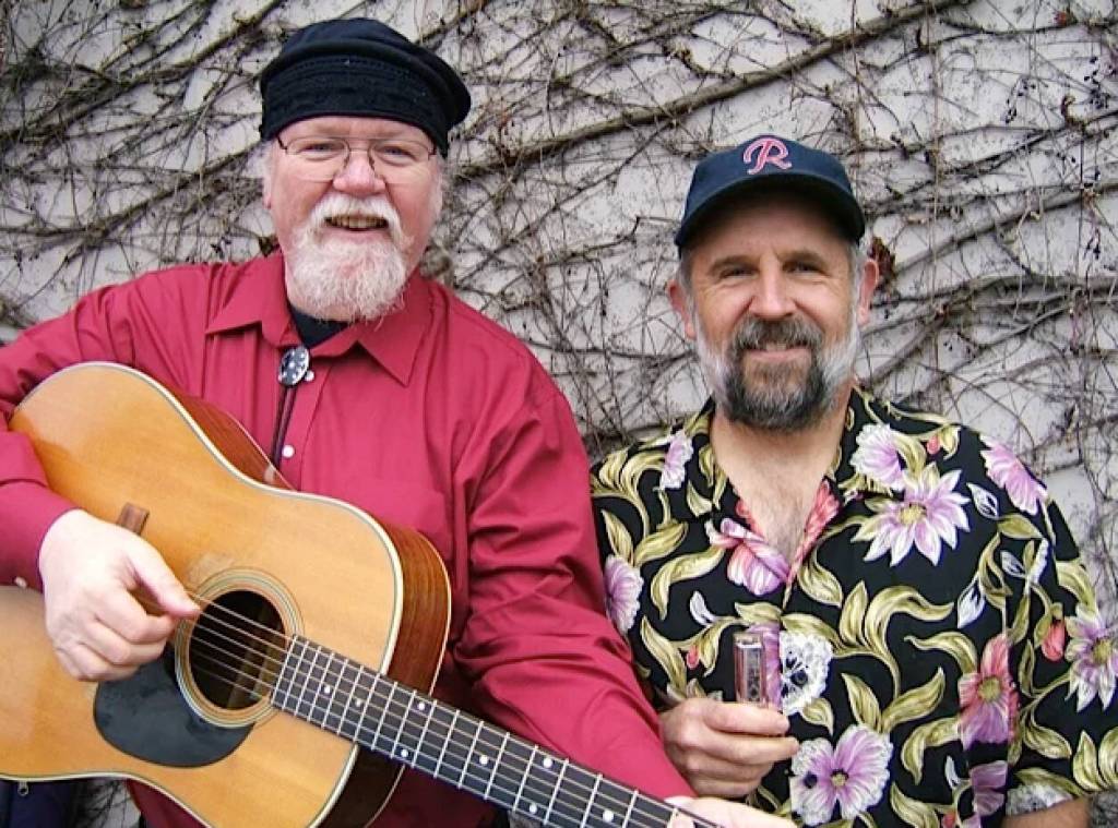 Orville Johnson and Mark Graham will bring their duo act, The Kings of Mongrel Folk, to Puget Sound Cooperative Credit Unions First Friday reception on Nov. 7. (Courtesy Photo)