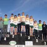 The Vashon boys cross-country team celebrates its fourth-place podium finish at the state championships in Pasco on Nov. 8. (John Decker Photo)