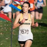 Senior captain Emily Harrington races to a 14th-place overall finish at the state cross-country championships in Pasco on Nov. 8. (John Decker Photo)