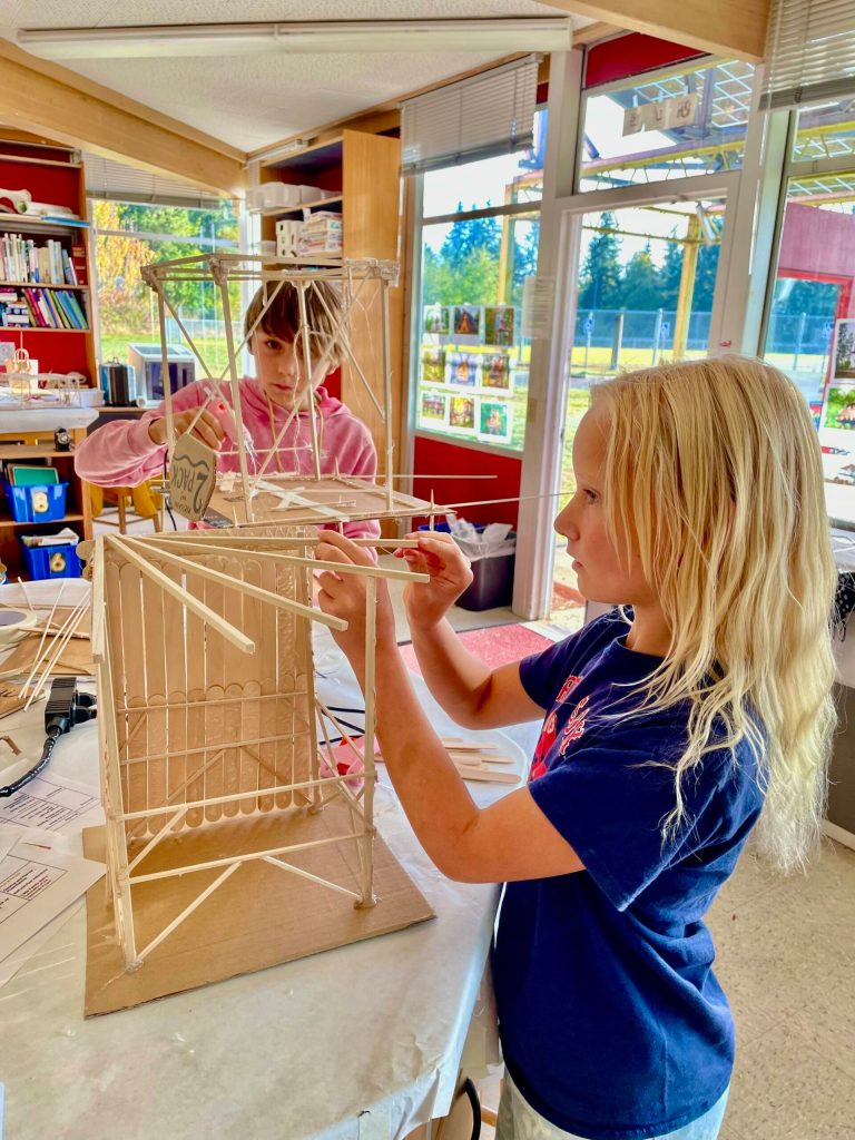 Fourth- and fifth-grade students work on building imaginative structures as part of their Team Wonder design project. (Courtesy Photo)