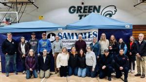 Courtesy Photo
Jill Yates (fourth from left, kneeling) and the team of volunteers assembled for a heart screening event held on Nov. 4 at Vashon High School.