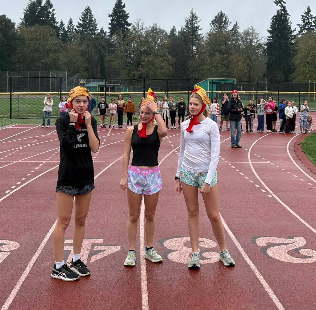 (Left to right) VHS cross country team members Emily Harrington, Cedar Henderson and Sadie Reissiger led the way at the annual Chautauqua Elementary School Turkey Trot on Wednesday, Nov. 26. (James Batey Photo)