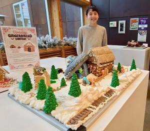 Courtesy Photo
Garrett Dorr, an eighth-grade student at Harbor School, stands with his gingerbread entry at the Vashon Center for the Arts holiday gingerbread contest.