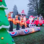 Terry Donnelly Photo
Lewis Roggenbucks home at 18911 Ridge Road SW features a festive lighted display with an inflatable Santa and reindeer.