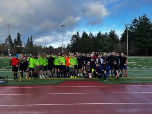 Courtesy Photo
Players from the adult team and the VISC Seadogs gather after the annual Ryan Krug Vashon Cup match on Sunday, Dec. 7, played in honor of the late Ryan Krug and in support of the Ryan Krug Memorial Scholarship.