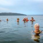 October: Jill Andrews, front right, swims one morning with her island swim club. (Terry Donnelly Photo)