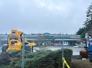 Aspen Anderson Photo
Part of the construction site currently occupies much of the parking lot outside IGA at Vashon Plaza.