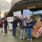 Islanders showed their knack for creative sign-making as they gathered for Saturdays protest in the center of town. (Elizabeth Shepherd Photo)