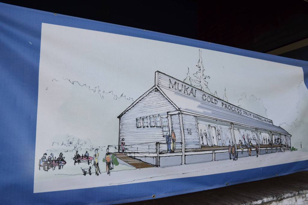 An illustrative banner hung outside the barn showing what its future may bring. (Tess Halpern Photo)