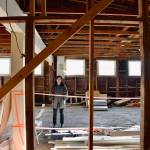 Jade Agua standing in the future kitchen space of Fernhorn Bakery. (Tess Halpern Photo)