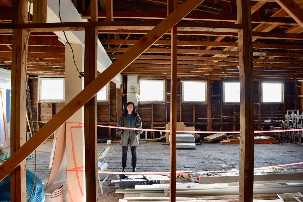 Jade Agua standing in the future kitchen space of Fernhorn Bakery. (Tess Halpern Photo)