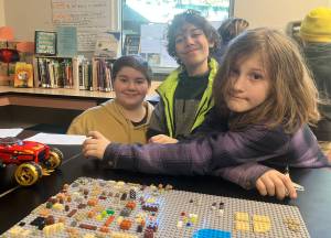 (Left to right) Phin and Pacha, seventh-graders, with fifth-grader George.