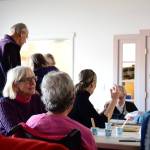 Tess Halpern Photo
Members and volunteers chat after completing a hand-massage activity.