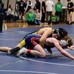 Senior Taevin Gilbert works to contain Life Christians King Stanley in the consolation semifinals. (Tony Puz Photo)