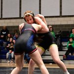 Senior Hazel Nielsen in neutral position prepares to throw her quarterfinal opponent. (Tony Puz Photo)
