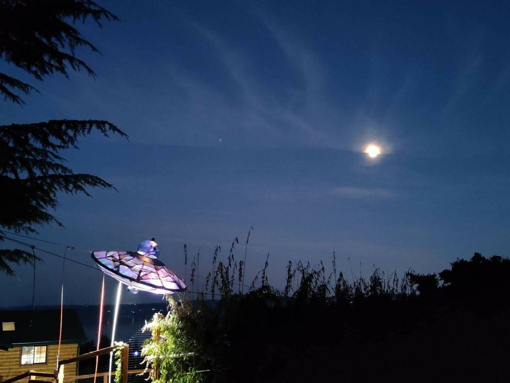 The UFO refurbished by Beursken hangs from cables above his driveway on Maury Island, decorating his home for Halloween. (Matt Beursken Photo)