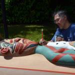 Courtesy Photo
Israel Shotridge working on the Quileute Archway at his home studio on Vashon installed in La Push, WA.