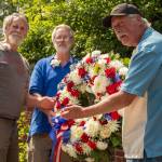Alex Bruell Photo
The Bacchus brothers  from left, Randy, Ladd and Brett  presented a wreath in 2025 in remembrance of Thomas and Douglas Ladd Bacchus at the Senior Center memorial.