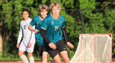 Senior midfielders Quill Tegenfeldt-Pfohman (front) and Avery MacLean helped control the tempo during the Vashon Pirates 3-1 win over Cascade Christian in the District 3 championship on May 14. The Pirates will host second-round and quarterfinal games in the 1A state tournament this weekend.