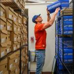 Terry Donnelly Photo
James Batey organizes inventory in the stock room of Flostate Running, his new shop in uptown Vashon.