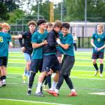 Dawn Stief Photo
The Vashon Pirates celebrate after winning the WIAA Class 1A boys soccer championship May 30 at Federal Way Memorial Stadium.