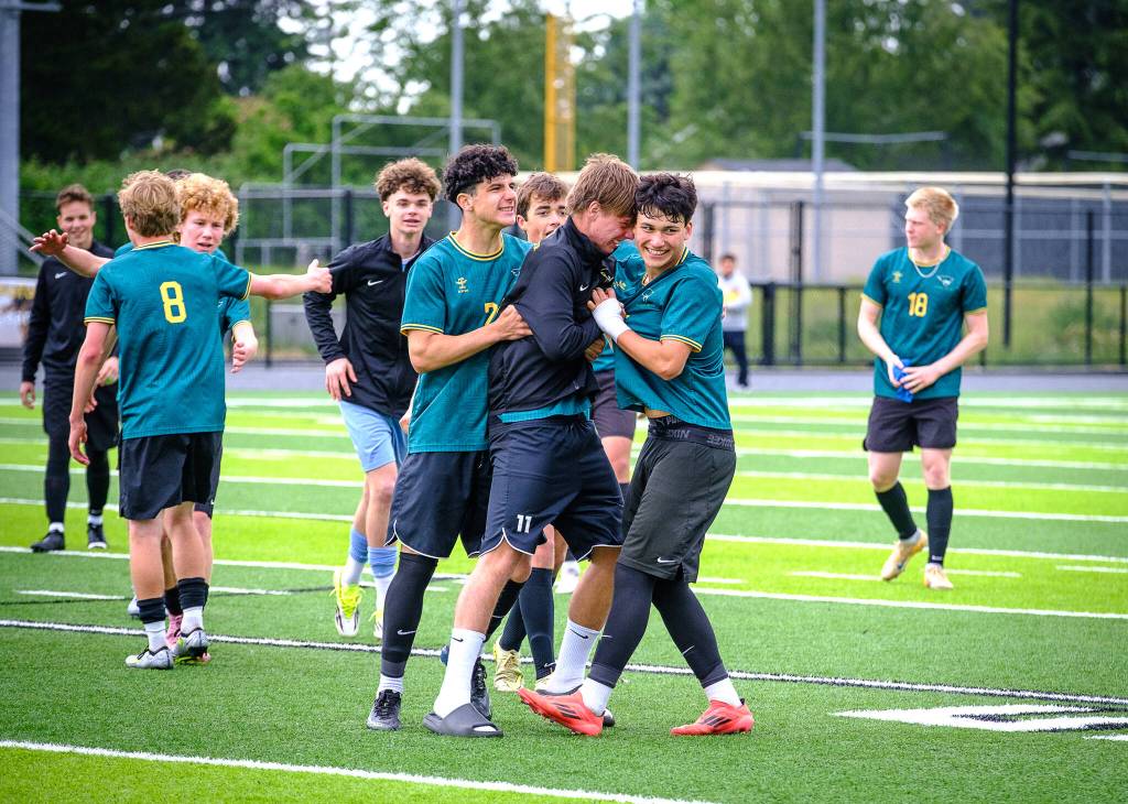 Dawn Stief Photo
The Vashon Pirates celebrate after winning the WIAA Class 1A boys soccer championship May 30 at Federal Way Memorial Stadium.