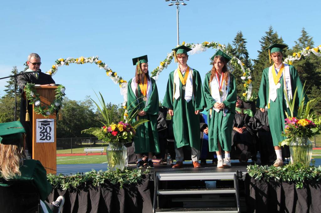 Valedictorians Rachel Gross, Emily Harrington, August Kampmeier and Isaac Newcomb.