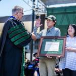 Jay Thompson Photo
Carl Hillman and Mayumi Ogawa accept a posthumous degree for their son, Sean Ogawa Hillman, from Cal Poly President Jeffrey D. Armstrong during the universitys June 14 commencement ceremony.